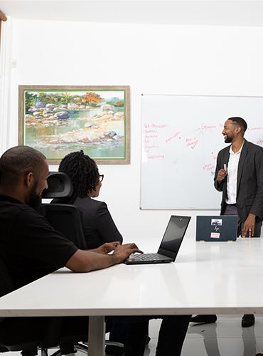 A Speur workshop at a whiteboard